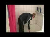 Get 2 Videos of a nice woman from our 2008 Archive enjoying her shiny nylon Rainwear at home