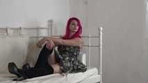 Lana tied with towels on bed