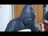 03:20 Min. video with Jill tied and gagged in shiny nylon rainwear