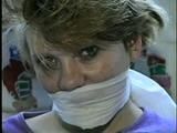 22 Yr OLD LISA IS RUBBER BAND BALL-GAGGED, MOUTH STUFFED, HANDGAGGED, OTM & CLEAVE GAGGED (D43-6)