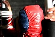Katharina tied and gagged in shiny nylon rainwear
