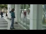 Alina walking on the street cruising around wearing sexy shiny nylon shorts under her jeans and a rain jacket (Video)