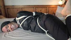 Rachel Adams tied and gagged in Rainwear