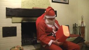 Santa Claus unpacking the rod