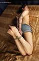 Sharlene hogtied on bed