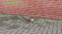 078015 Rachel Evans Pees Beside The Office Building