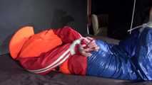 Watching Jill wearing a sexy shiny nylon rain pants and three shiny nylon rain jackets and a life jacket being tied and gagged and HOODED three times (Video)