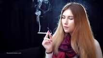 Mysterious girl Valya poses on camera with a tasty 120mm cigarette