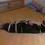a video with one of our archive girls bound and gagged in a shiny black PVC sauna suit