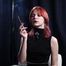 Red Elegance: Yuliana’s Smoking Ritual