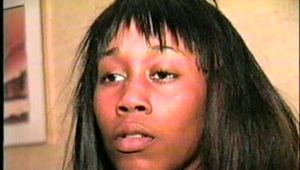 BLACK FEISTY & CUTE SARAH IS TAPE GAGGED, MOUTH STUFFED, TIED WITH RAWHIDE & TIGHTLY HANDGAGGED (D53-16)