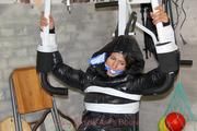 Katharina tied and gagged in a shiny nylon downcoat and shiny nylon pants