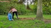 Rubber boot mistress presses slave face into manure