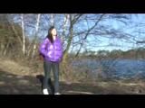 Alina walking in a lake wearing a supersexy purple down jacket and a jeans (Video)