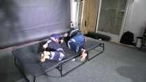 Aiyana and Ms Ungeniert bound and gagged in shiny nylon Rainwear