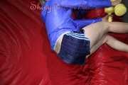 Watching sexy Sonja wearing a supersexy oldschool blue shiny nylon shorts and a lightblue rain jacket during her workout with barbells (Pics)