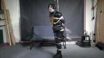 Rey bound and gagged in a shiny Downjacket and Leatherpants