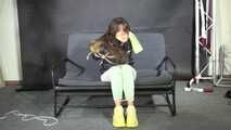 Marie bound and gagged in a shiny nylon Downjacket