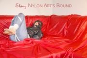 Sonja tied and gagged with ropes and a ball gag wearing a sexy grey shiny nylon rain pants and a black down jacket (Pics)