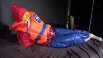 Watching Jill wearing a sexy shiny nylon rain pants and three shiny nylon rain jackets and a life jacket being tied and gagged and HOODED three times (Video)