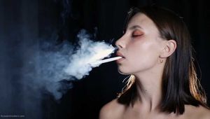 Smoking two all white cigs in the studio