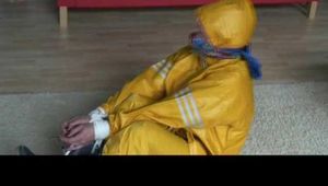 Watch 3 Archive Videos with Katherina enjoying Bondage in her shiny nylon Rainwear from 2010