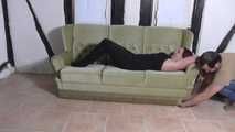 Aurora roped on couch 1/2