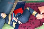Jill tied, gagged and hooded on the floor with tape wearing an oldschool rain combination (Pics)