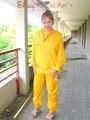 Leonie wearing a super sexy yellow rainwear combination posing outdoor (Pics)