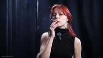 Red Elegance: Yuliana’s Smoking Ritual
