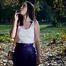 Smoking in the autumn park with lovely lady