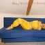 Archive girl tied and gagged by using tape on a sofa wearing an yellow rainsuit (Pics)