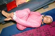 Katharina tied and gagged in shiny nylon ski suit