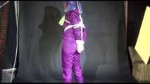 MARA tied and gagged overhead with ropes and a cloth gag wearing a super sexy super shiny purple rainsuit and blue rubber boots (Video)