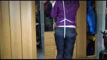 Pia tied with ropes overhead and gagged with a ballgag wearing sexy rain pants and a rain jacket (Video)