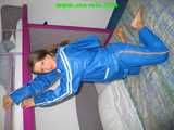 156 pictures of Katharina in shiny nylon rainwear ffrom the years 2005 to 2008!