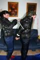Petra was tied by Jill in shiny downjackets 