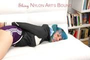 Mara tied and gagged on a white sofa in a reading lounge wearing a sexy purple shorts with shadow stripes and a black rain jacket (Pics)