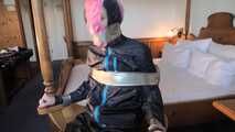 Rachel Adams bound, pantygagged and pantyhooded in shiny nylon Rainwear