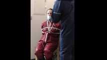 Lady Nadja getting bound and gagged by a raincoated stranger
