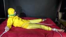 Watching sexy Pia being tied and gagged with ropes on a bed and a clothgag wearing sexy yellow shiny nylon rainwear (Video)