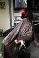 Watch Pia enjoying her Rainsuit bound and gagged on a Hairdresserchair