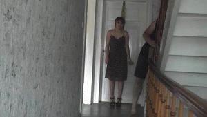 Kim tied to the door