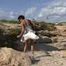 016195 Eve Sits On A Rock To Pee