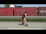 Stella during inline skating wearing shiny nylon shorts and rain jacket (Video)