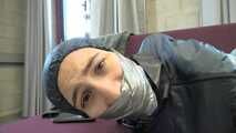 Rey Sanson bound and gagged in a shiny nylon Rainwear gets Pants ripped of