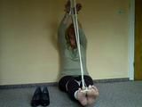 Tied bare feet