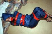 Stella taped in blue shiny nylon rainwear