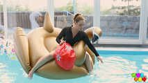666 Foxy Sanie has fun in the swimming pool.