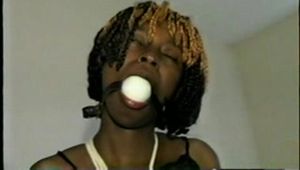 21 Yr OLD BLACK COLLEGE STUDENT MICHELLE GETS BALL-GAGGED, ELBOWS TIED TOGETHER AND IS CHAIR TIED WEARING PINK & BLACK LINGERIE (D56-3)